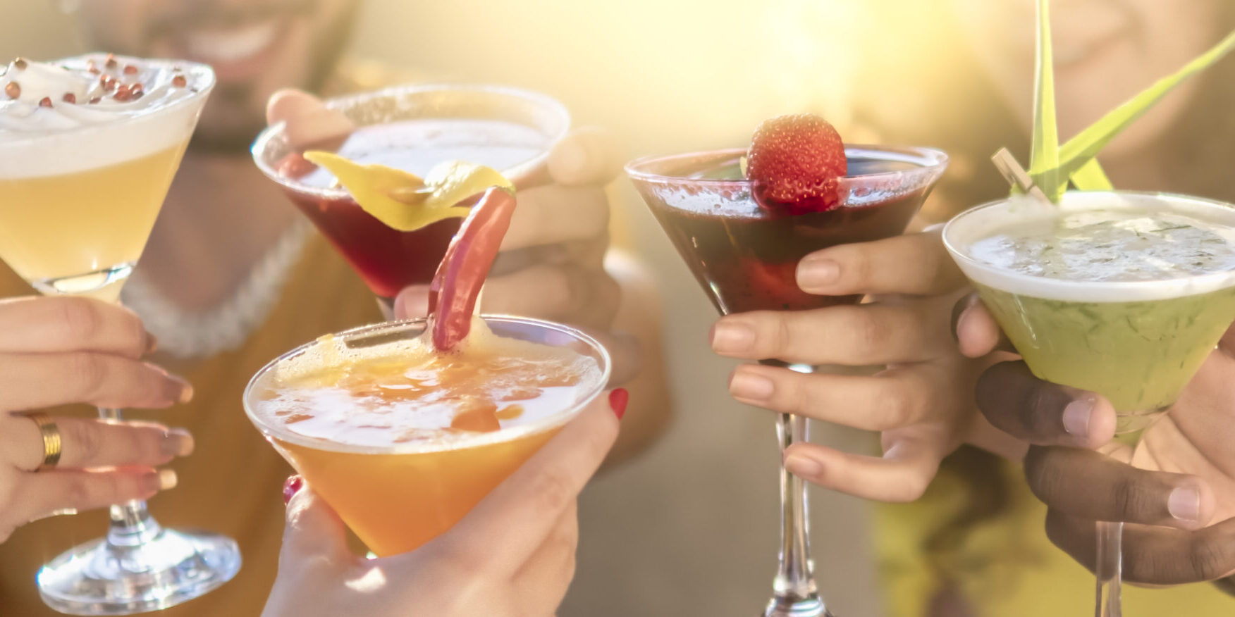 Happy young friends toasting with cocktails together – Food and